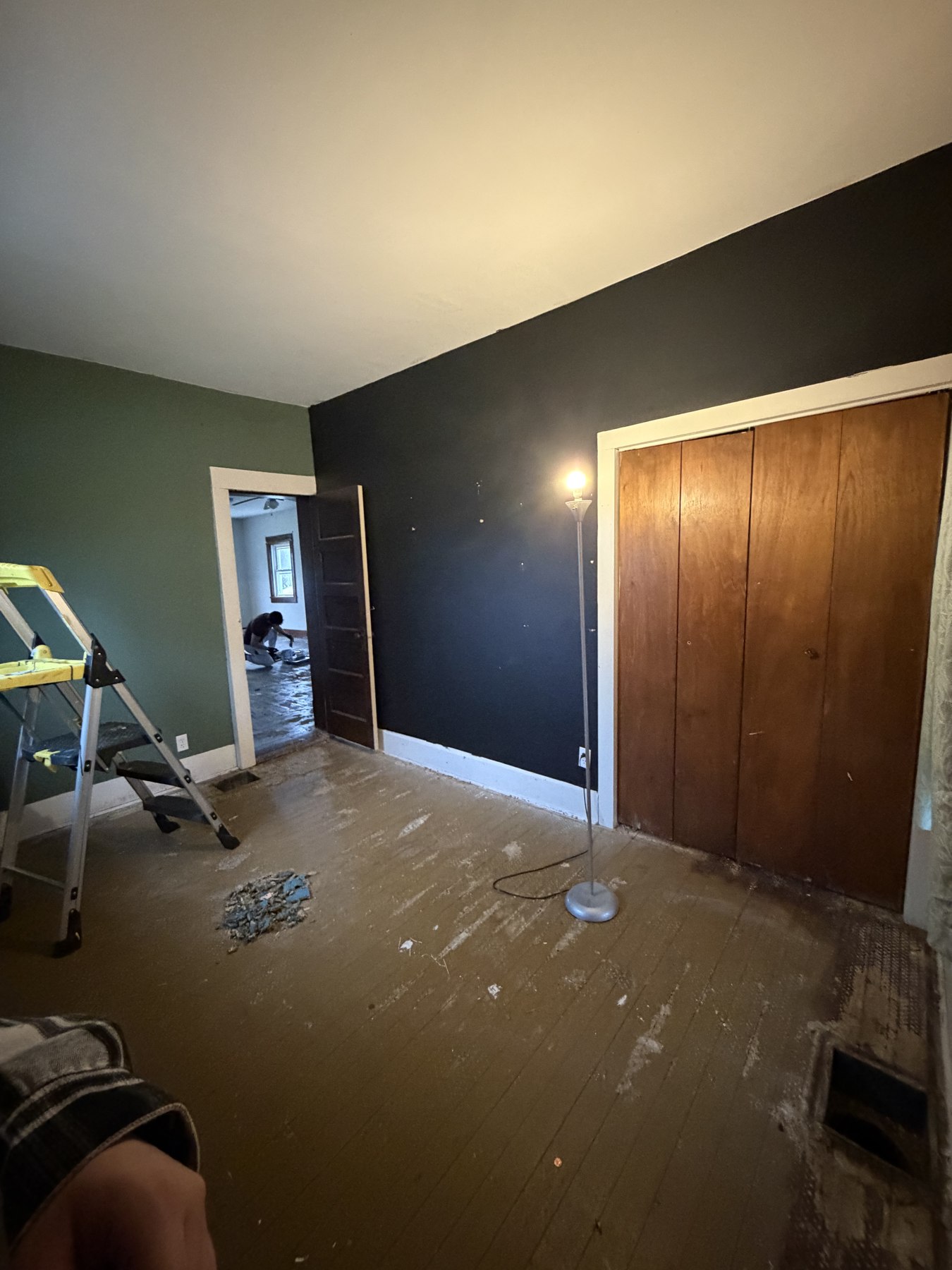 Interior room showing contrasting dark walls and a light ceiling
